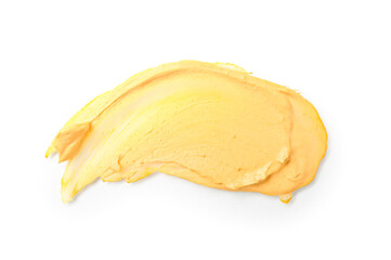 Smear of turmeric mask on white background