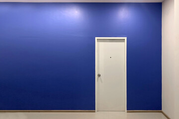 Modern minimalism room with a door on blue background.
