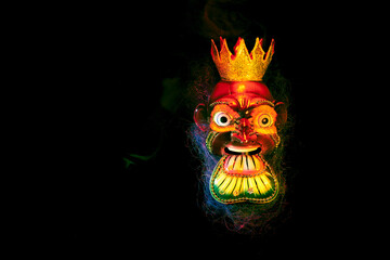 Moreno mask, traditional dance of the Oruro carnival in Bolivia, with copy space black background.