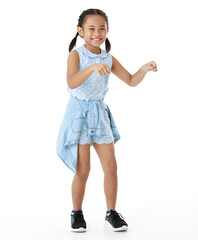 Portrait full body studio cutout shot of Asian young happy cheerful pigtail braid hairstyle elementary school girl in blue sleeveless dress standing posing smiling look at camera on white background