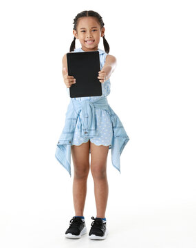 Portrait full body studio isolated cutout shot of Asian young pigtail braid hair little girl model in blue dress standing smiling holding black blank screen tablet look at camera on white background