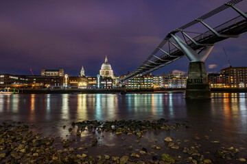Fototapeta na wymiar St Pauls Cathedral and Millennium Bridge at night, City of London, London, England
