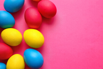 Multicolored Easter eggs on color background