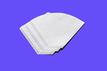 Bleached paper coffee filter isolated on blue background. Alternative brewing pour over v60 concept. Minimalistic abstract background for store, shop, retail. mock up, top view, place for text