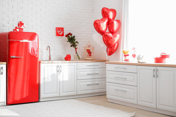 Interior of stylish kitchen decorated for Valentine's day celebration
