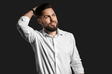 Obraz premium Stylish bearded man on dark background