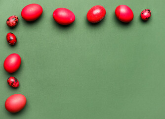 Beautiful Easter eggs on green background