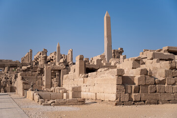 Ancient Temple of Karnak in Luxor - Ruined Thebes Egypt. Walls. obelisks and statutes at Karnak Temple. Temple of Amon-Ra