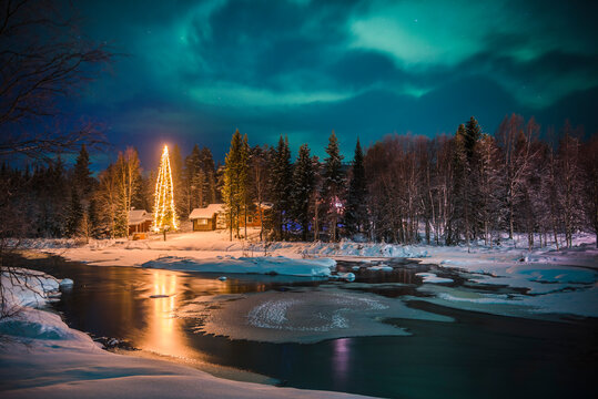 Northern Lights (aurora borealis) over Akaslompolo, a small town in Finnish Lapland, inside Arctic Circle in Finland
