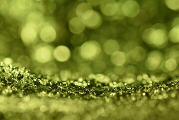 Obraz premium Green glitter lights texture. Abstract christmas background.