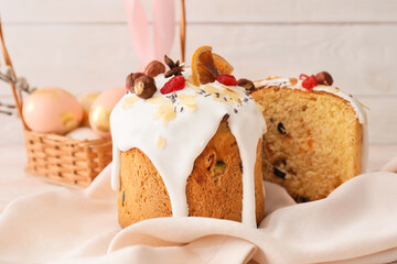 Delicious Easter cakes on white wooden background