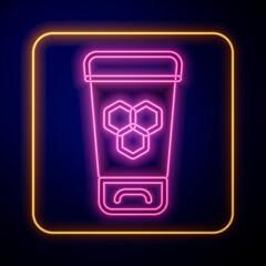 Glowing neon Cosmetic tube with honey icon isolated on black background. Natural skin care. Vector