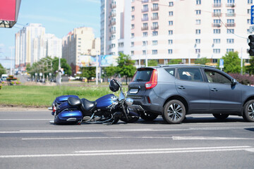 Traffic accident between electric bicycle and car, motorbike fell on asphalt, eyewitness man