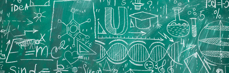 School chalk board is painted with different formulas and signs from the school curriculum. A green blackboard is drawn in chalk as a background. The concept of knowledge and learning. long banner.
