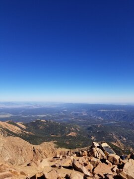 Scenic Colorado View From Mountain with Rock Formations, Blue Skies and Green Vegetation