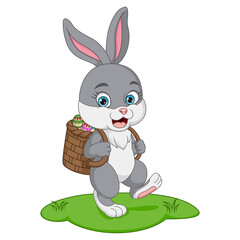 Obraz premium Cute little bunny carrying basket of easter eggs