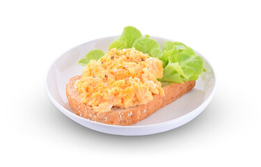 Whole wheat bread and scrambled eggs in a plate isolated on white background.