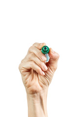 Fototapeta premium Close-up Female hand writing with a pen, green pen in hand, isolated on white background