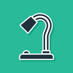 Blue Table lamp icon isolated on green background. Vector