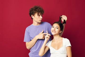 guy holding a girl by the pigtail Friendship fun