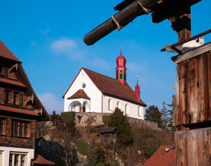 Flueli-Ranft, Switzerland - January 18, 2022: A view at the parish church of Carl Borromaus from...