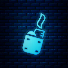 Glowing neon Lighter icon isolated on brick wall background. Vector