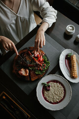 A high angle shot of a breakfast with gourmet dishes
