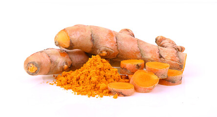 Turmeric rhizomes and powder on a white background