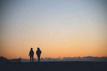 Fototapeta premium silhouette of a person, Sunset colour in Izu Peninsula