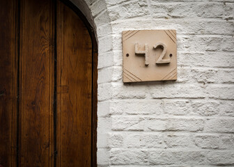 Old house number plate, Damme, Belgium