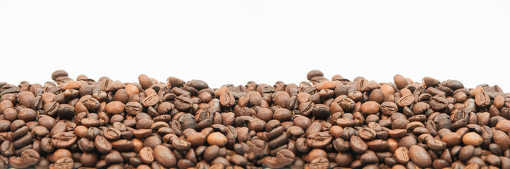 coffee on a white background close-up. concept of making coffee. roasted coffee beans