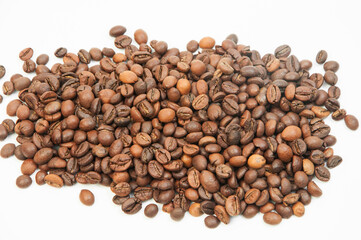 coffee on a white background close-up. concept of making coffee. roasted coffee beans