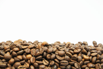 coffee on a white background close-up. concept of making coffee. roasted coffee beans