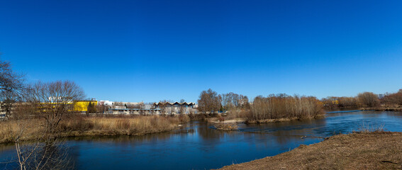 Landscape on the river and empty bl;ue sky