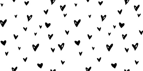 Obraz na płótnie Canvas Vector Seamless abstract pattern of small hearts. Hand drawn doodle background, texture for textile, wrapping paper, Valentines day.