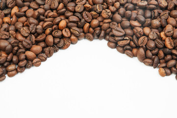 coffee on a white background close-up. concept of making coffee. roasted coffee beans