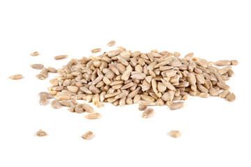 Pile of peeled sunflower seeds, isolated on white background.