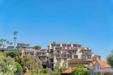 Fototapeta premium Residential buildings on top of a rocky mountain at San Clemente, California