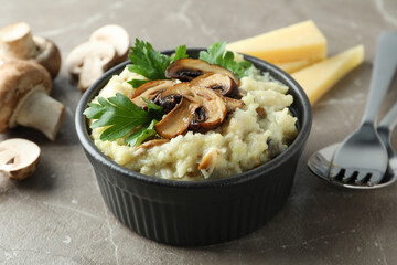 Concept of tasty food with risotto with mushrooms, close up