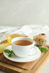 Concept of hot drink with buckwheat tea, selective focus
