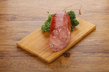 Pork ham sausage over board