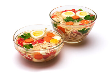 Delicious chicken aspic in glass bowl isolated on white background