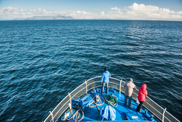 Tourists on a whale watching boat, Reykjavik, Iceland, Europe - obrazy, fototapety, plakaty