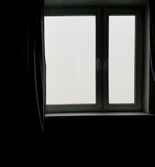 window in the dark room