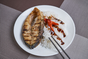 grilled meat with vegetables, fish with rice