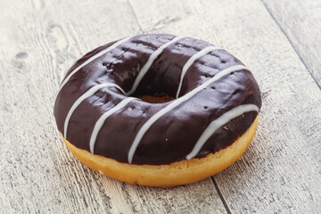 Glazed sweet tasty chocolate donut