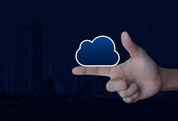 Cloud computing icon with copy space on finger over world map, modern city tower and skyscraper, Technology cloud computing concept, Elements of this image furnished by NASA