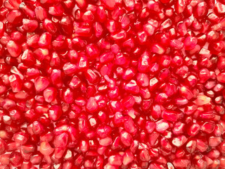 Fresh pomegranate seeds background