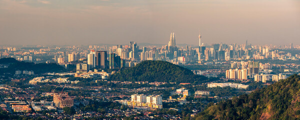 Kuala Lumpur skyline seen at dawn from Bukit Tabur Mountain, Malaysia, Southeast Asia
