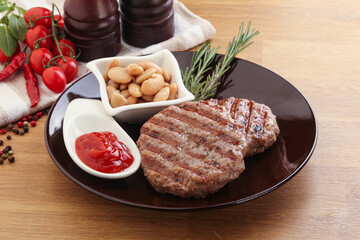 Grilled beef burger cutlet with sauce